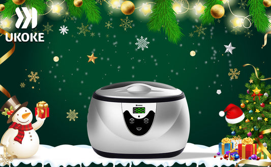 Ultrasonic cleaner with digital display in festive Christmas setting with snowman and tree