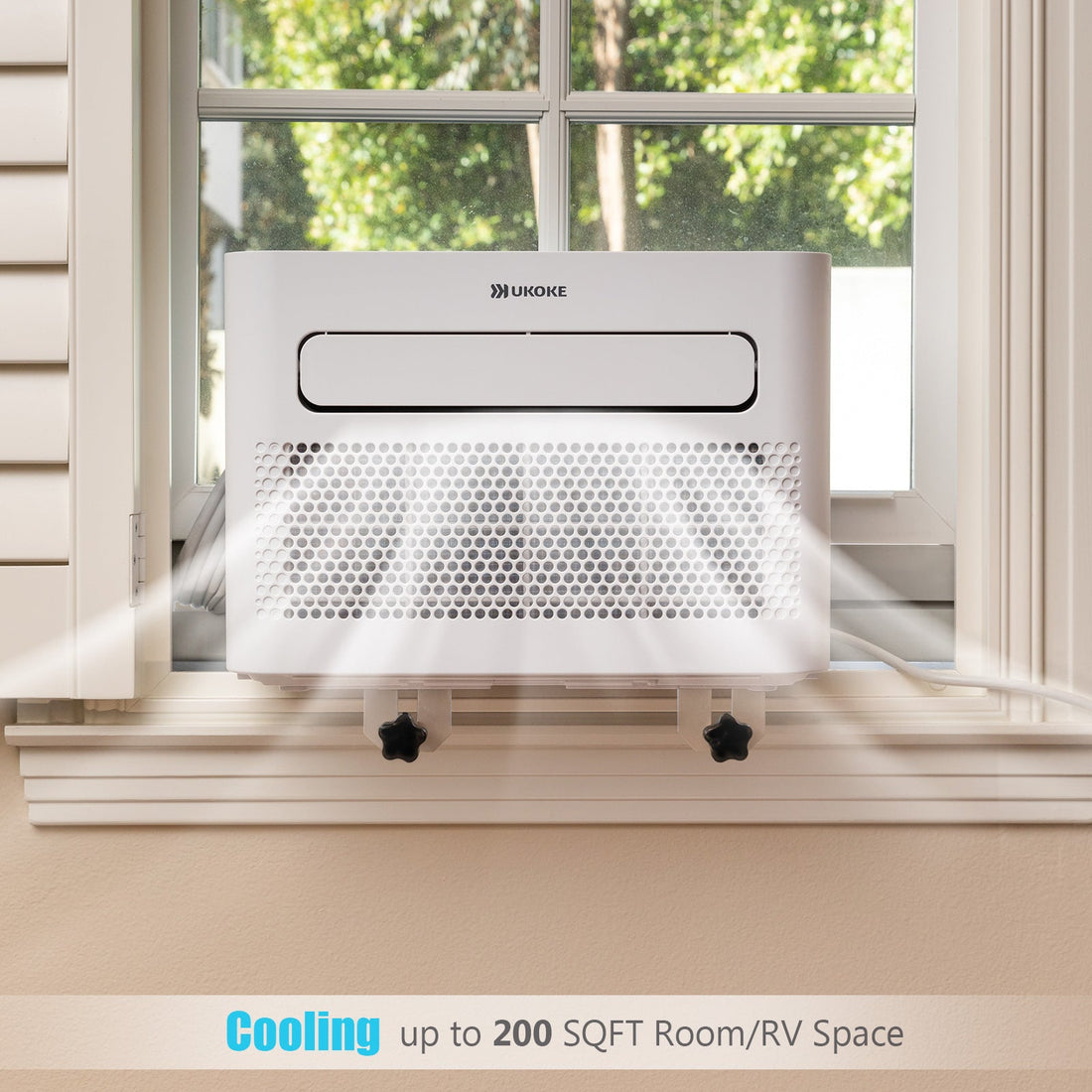 Window air conditioner cooling a room, suitable for spaces up to 200 square feet